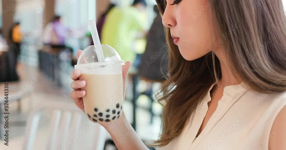 asian woman drink bubble tea