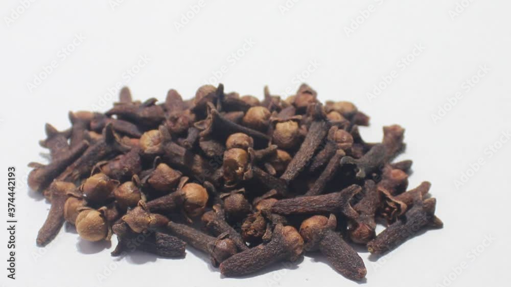 Cloves on white background with selected focus Cloves on white background with selected focus