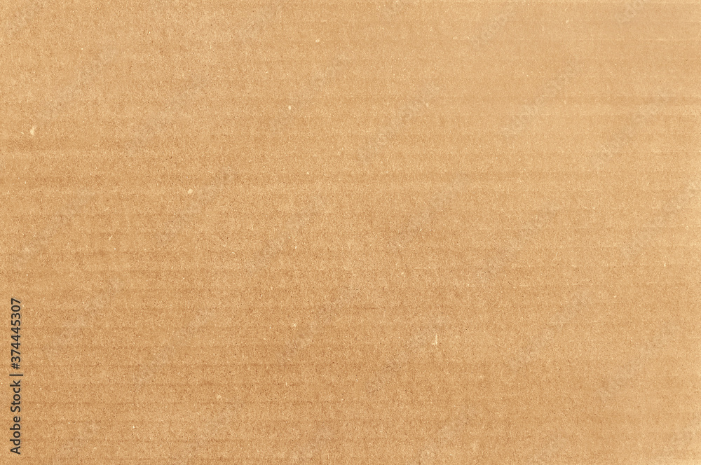 Fototapeta premium Cardboard sheet texture background, pattern of brown paper box in old vintage style.
