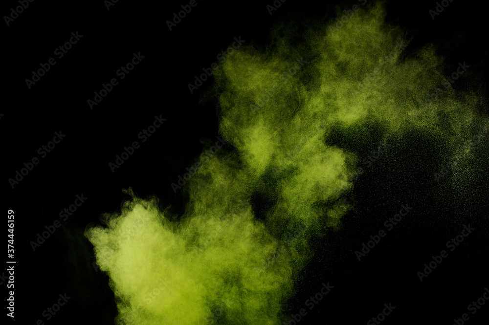 Light green powder explosion on black background. Colored powder cloud. Colorful dust explode. Paint Holi. Light green powder explosion on black background. Colored powder cloud. Colorful dust explode. Paint Holi.