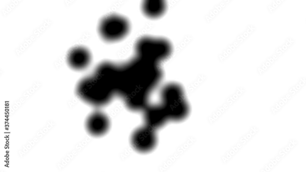 Blurred background. Black drops black ink dropped on white plane Blurred background. Black drops black ink dropped on white plane