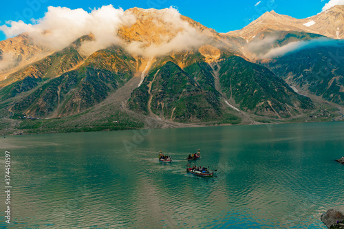 beautiful lake saiful malook and mountains reflection on water - KPK lake in the summer evening with clear sky photo