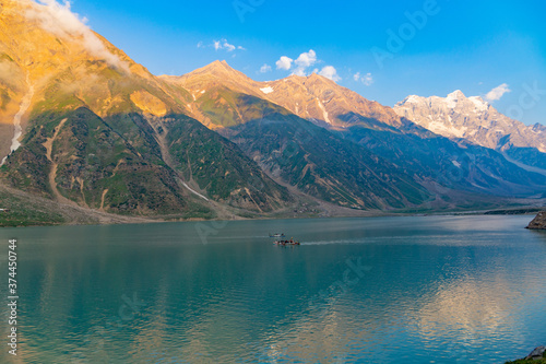 beautiful lake saiful malook and mountains reflection on water - KPK lake in the summer evening with clear sky photo