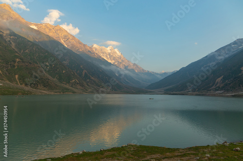 beautiful lake saiful malook and mountains reflection on water - KPK lake in the summer evening with clear sky © Safeer
