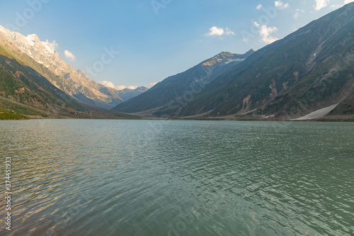 beautiful lake saiful malook and mountains reflection on water - KPK lake in the summer evening with clear sky photo