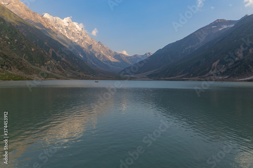 beautiful lake saiful malook and mountains reflection on water - KPK lake in the summer evening with clear sky photo