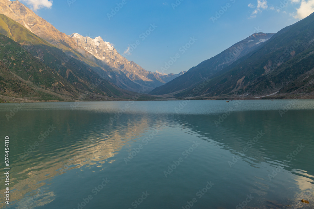 beautiful lake saiful malook and mountains reflection on water - KPK lake in the summer evening with clear sky beautiful lake saiful malook and mountains reflection on water - KPK lake in the summer evening with clear sky