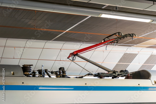 railway pantograph on a passenger train