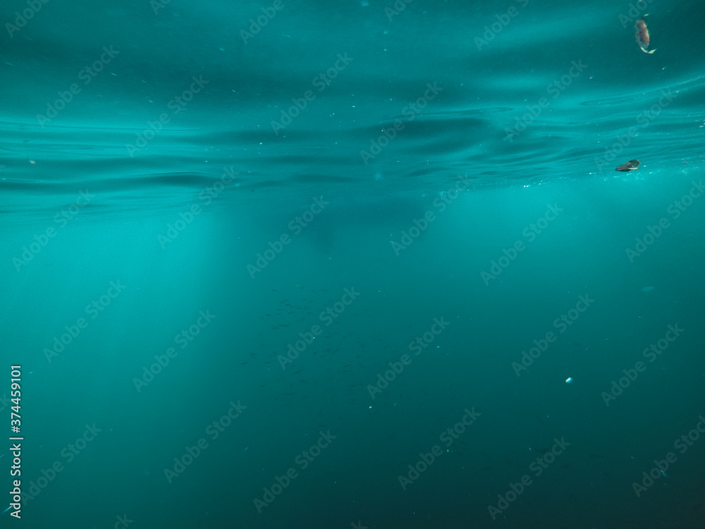 underwater texture shot blue sea water with sunbeam underwater texture shot blue sea water with sunbeam