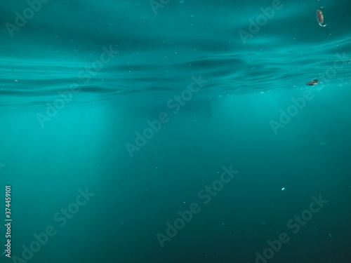 underwater texture shot blue sea water with sunbeam