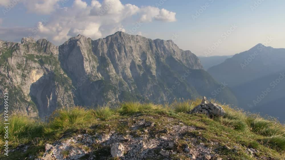 View from Mngart saddle. Beautiful Alp landscape in Slovenia. View of Italian mountains. View from Mngart saddle. Beautiful Alp landscape in Slovenia. View of Italian mountains.