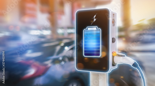 Wallpaper Mural Loading energy of an electric car, Power Supply charging on charge station electromobility environment-friendly, plugged into an electric automobile being charged. Torontodigital.ca