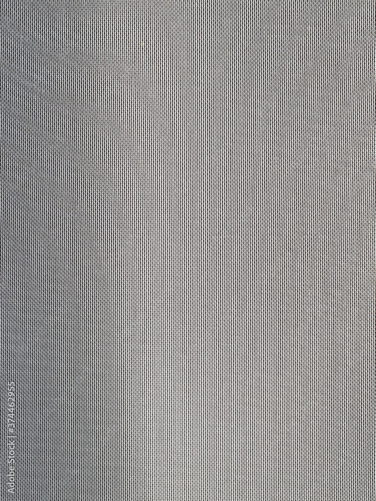 Fototapeta premium texture of curtain background to filter out the sunlight inside the building. Abstract image of texture