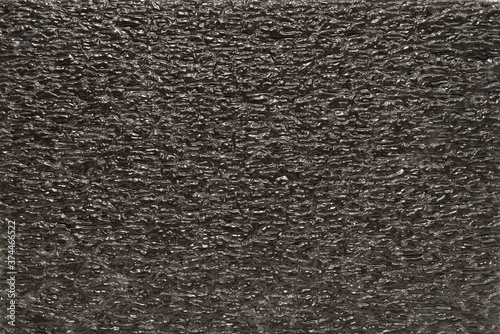Vászonkép Black EPE foam polyethylene packaging as background