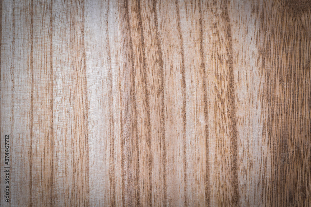 Naklejka premium Vertical pattern, Smooth brown wooden for background and other decorations.