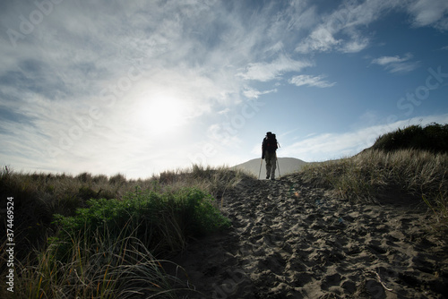 Walking on the black-sand Anawhata beach, Waitakere, New Zealand