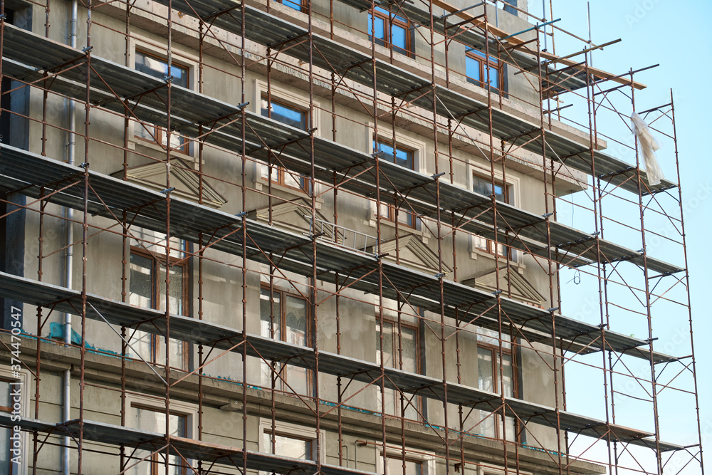 scaffolding and new building as background