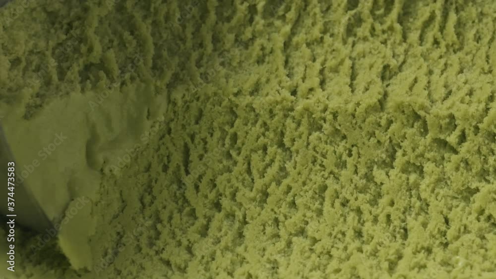 Slow motion closeup matcha ice cream scooping Slow motion closeup matcha ice cream scooping