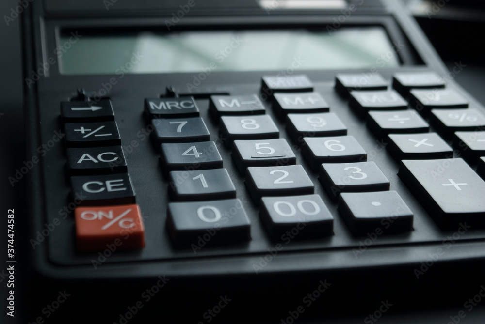 Financial accounting, money calculator on table Financial accounting, money calculator on table