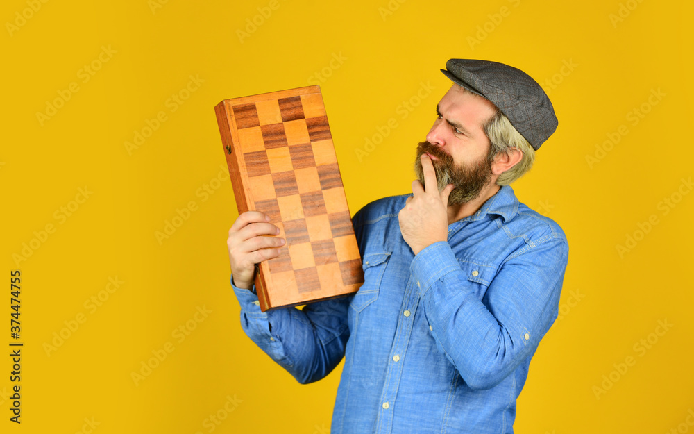 Grandmaster experienced player. Game strategy concept. Chess lesson. Cognitive development. Teacher chess competition. Board game. Bearded man playing chess. Chess figures. Intellectual games Grandmaster experienced player. Game strategy concept. Chess lesson. Cognitive development. Teacher chess competition. Board game. Bearded man playing chess. Chess figures. Intellectual games