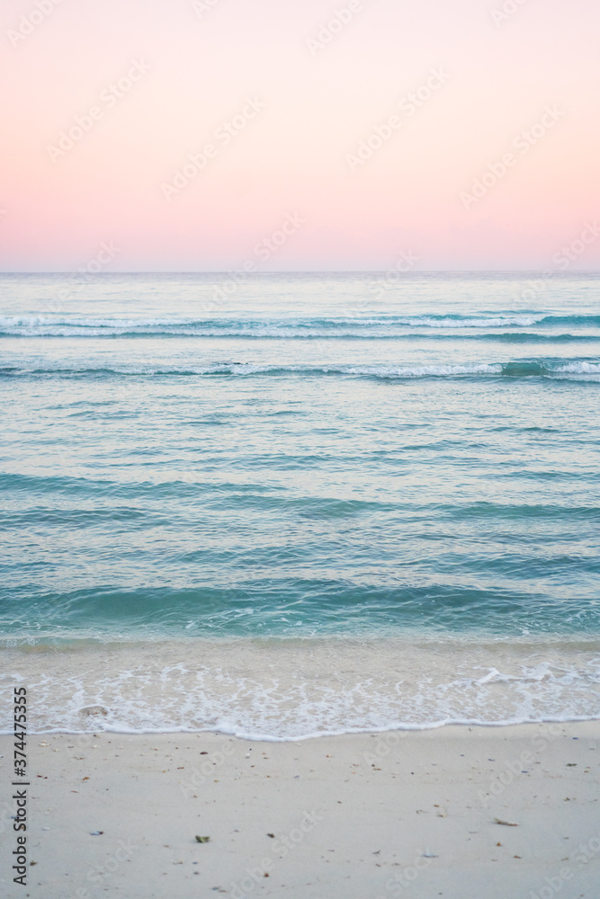 Pink sunrise on the beach