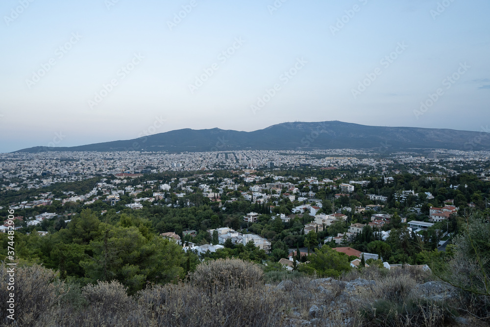 View of the northern eastern suburbs of Athens city-Greece during dusk.