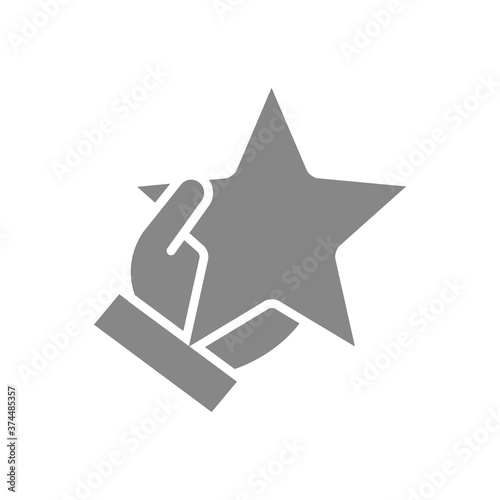 Hand holds star gray icon. Customer review, add to favorites, rating, quality control symbol