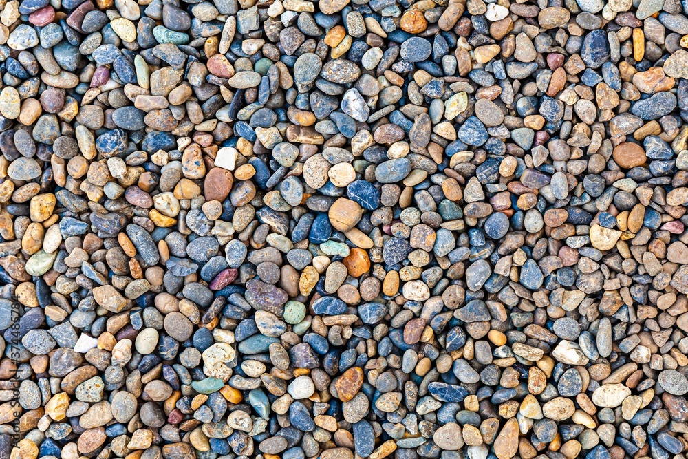 Small stone gravel of various colors background and pattern Small stone gravel of various colors background and pattern