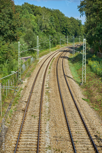 Railway tracks are photographed from above. Two railway tracks in parallel