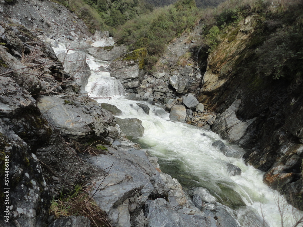 waterfall in the mountains waterfall in the mountains
