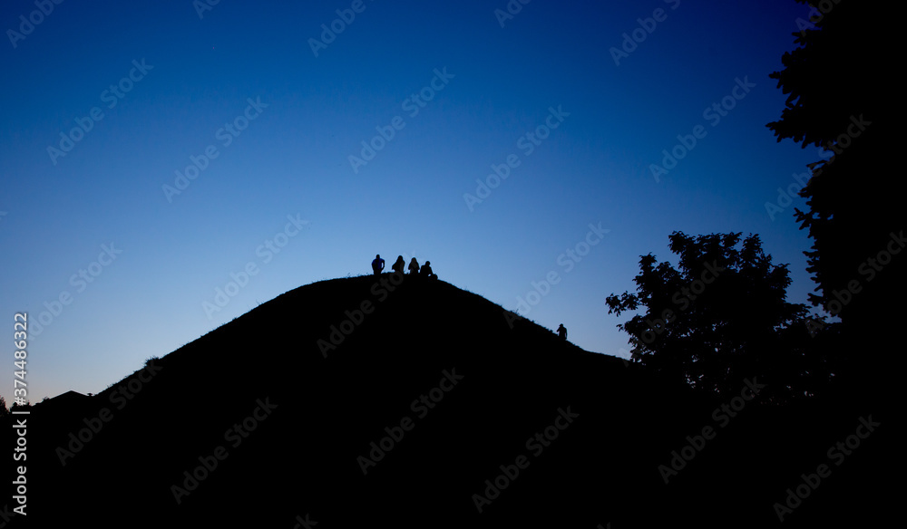 Silhouette of a group of people against the sky