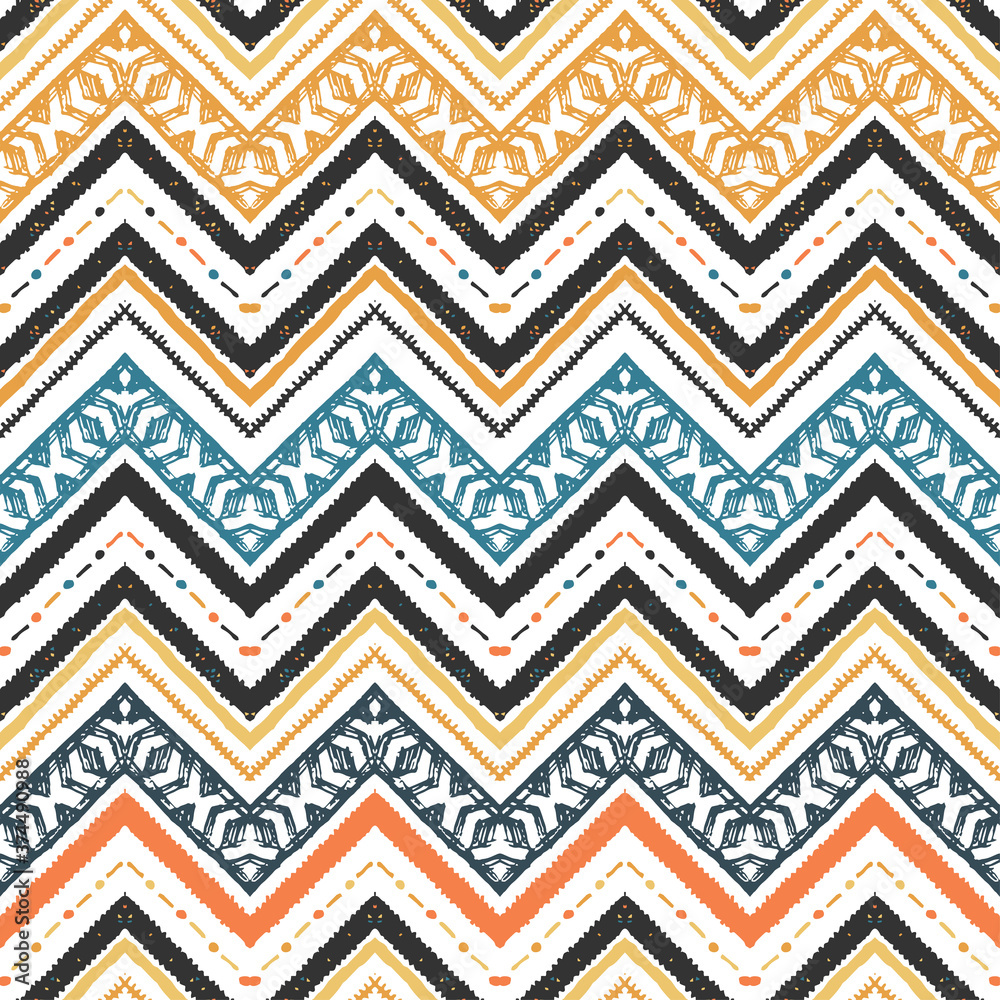 Seamless ethnic zigzag chevron pattern. Hand drawn colorful geometric background. Striped tribal motifs. Vector illustration