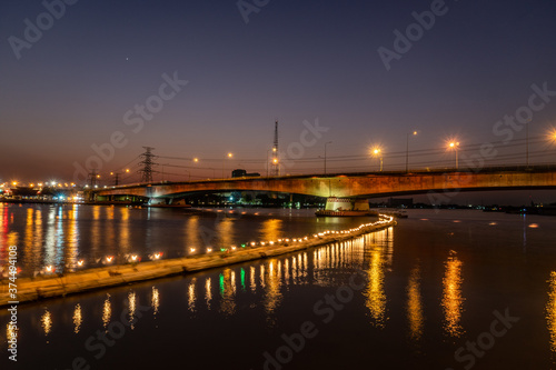 Rama VI Bridge Evening along the Chao Phraya River, Bangkok, important photo spots © jiradet_ponari