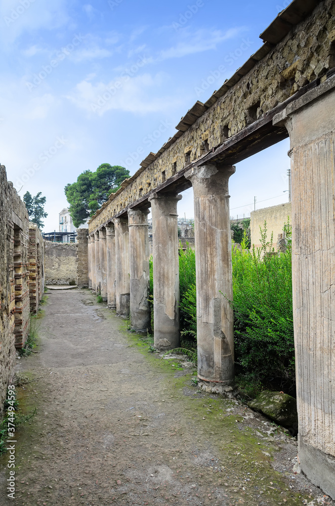 Ruins of Herculaneum. Herculaneum is famous for having been buried in ash,during the eruption of Mount Vesuvius in AD 79. Herculaneum,Italy Ruins of Herculaneum. Herculaneum is famous for having been buried in ash,during the eruption of Mount Vesuvius in AD 79. Herculaneum,Italy