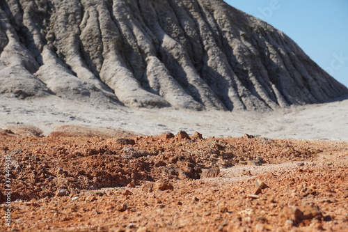 Принти на полотні Lifeless Martian landscape, barren red earth. Clay quarry.