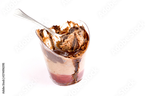 chocolate cocoa vanilla mousse on a spoon on white background photo