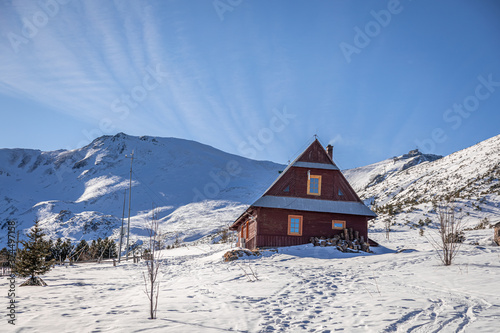 Wooden cottage in Gasienicowa valley at winter, Tatra mountains