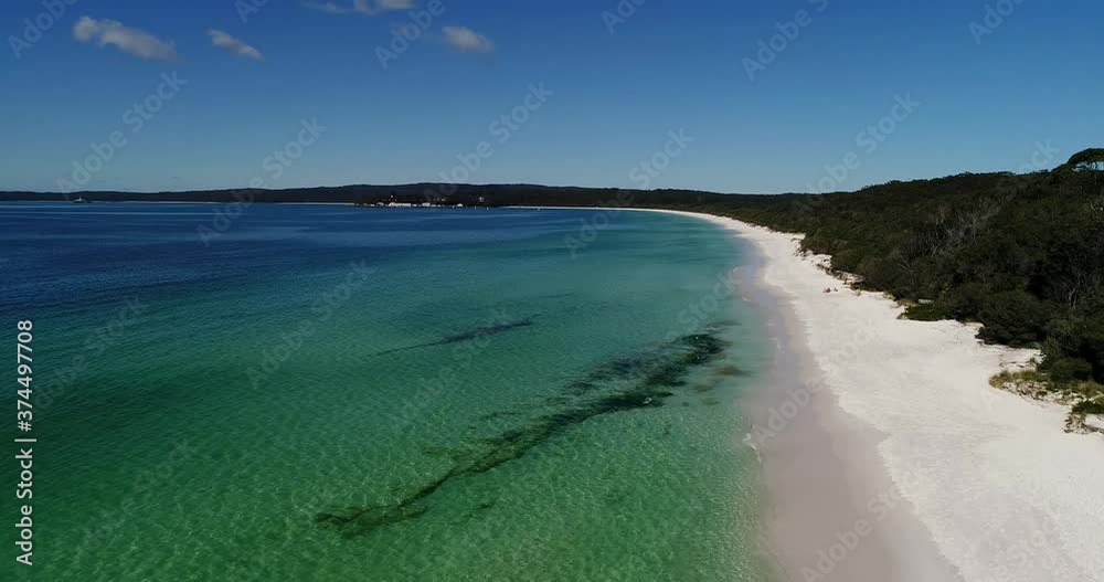 Clean white sandy beach in Jervis bay of Australia – aerial 4k flying.
Clean white sandy beach in Jervis bay of Australia – aerial 4k flying.