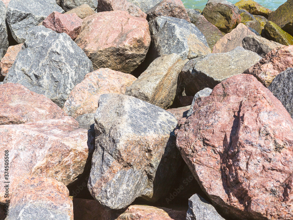 Granite. Many stones, granite stones background