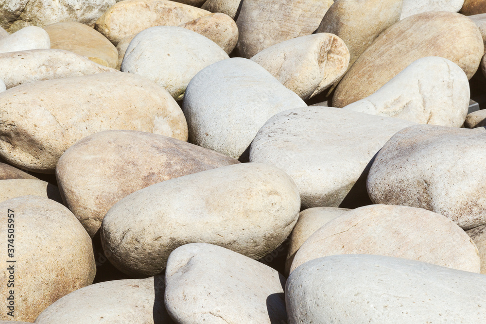 lot of stones close-up on beach, pebbles as textured background lot of stones close-up on beach, pebbles as textured background