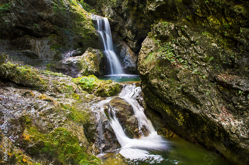 Fototapeta Naklejka Na Ścianę i Meble -  Majestic waterfalls on the stream Gačnik, Soca valley, Slovenia, Europe