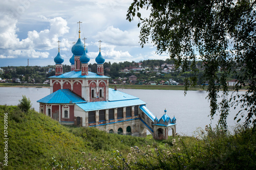 View of Volga river and Kazan church (Kazanskaya church, 1758). Tutayev, Yaroslavl Oblast, Russia. photo