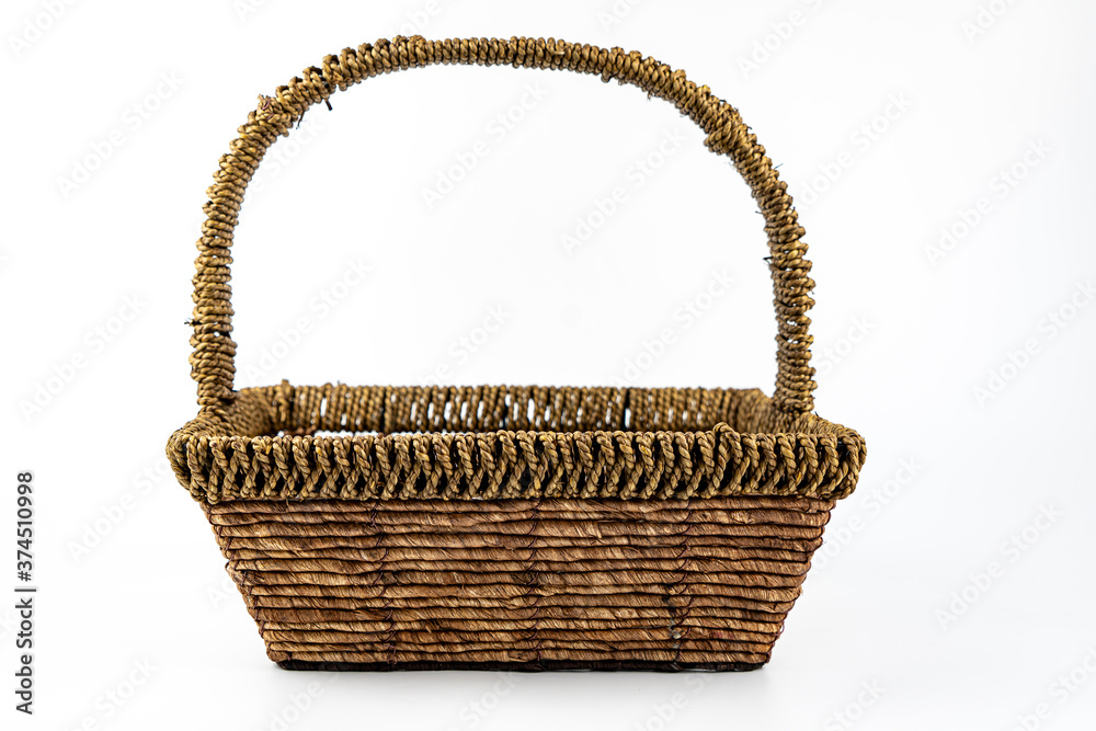 empty wicker basket isolated on white