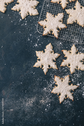 Homemade Snowflake Cookies on a Dark Blue Background