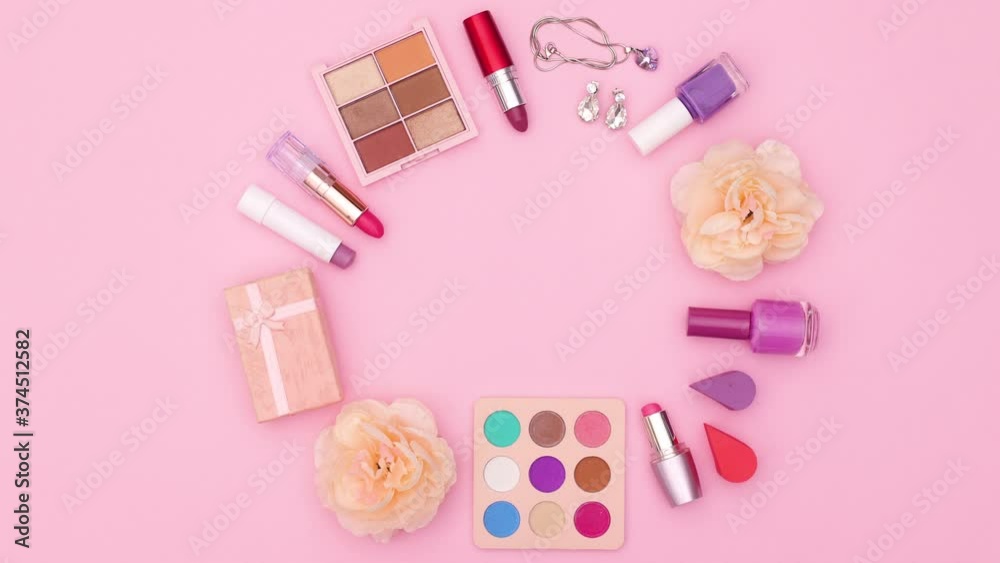 Make up products and accessories blinking in circle on pink theme. Stop motion Make up products and accessories blinking in circle on pink theme. Stop motion