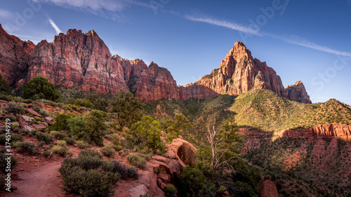 The end destination in sight on the Watchman Hiking Trail in Zion National Park in Utah, USA during a sunrise hike photo