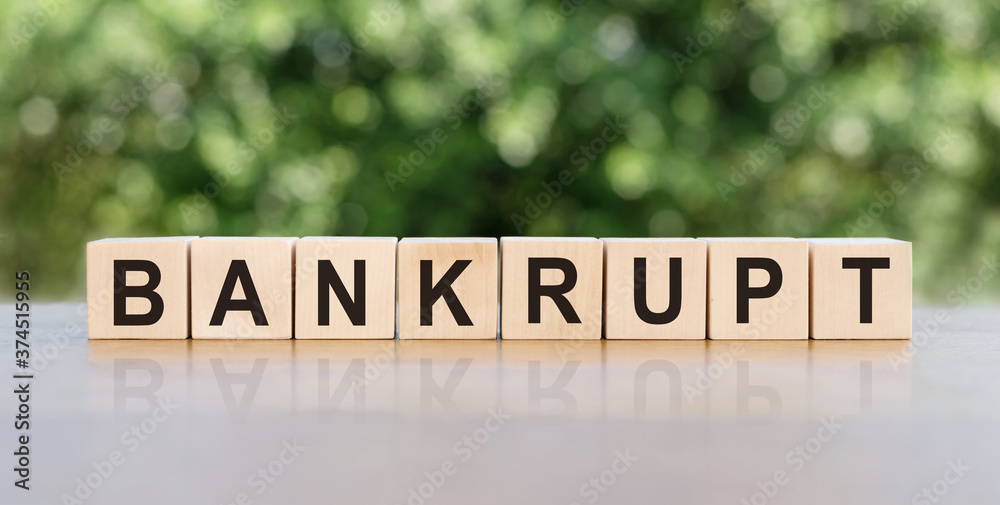 the word BANKRUPT on wood cubes. Financial concept