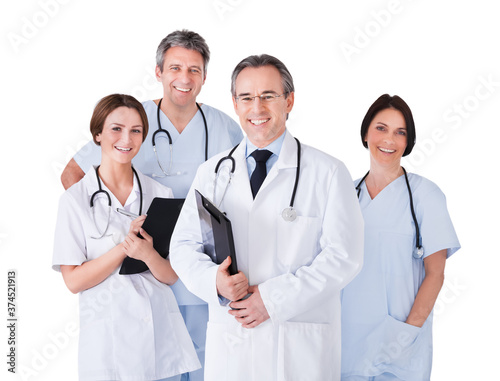 Male Doctor In Front Of Team