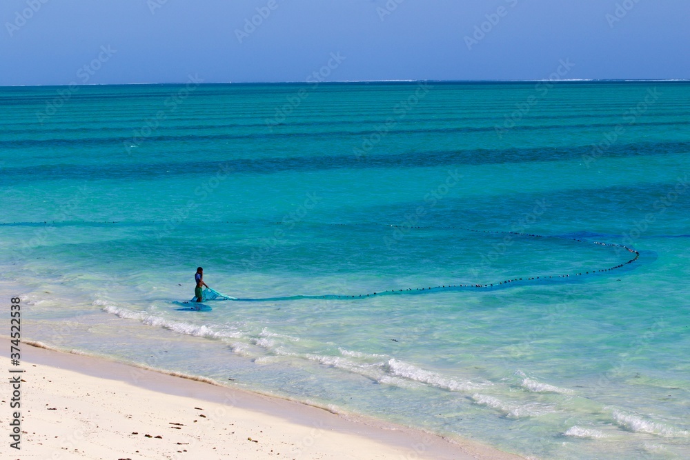 White  tropical  beach and turquoise sea water in the south of Madagascar