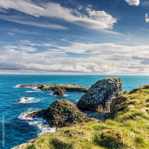 Fototapeta Naklejka Na Ścianę i Meble -  Gorgeous summer landscape of Iceland of sunny day, near Arnarstapi village. Snaefellsnes peninsula. Amazing nature of Iceland. Iconic location for landscape photographers. Picture of wild area.
